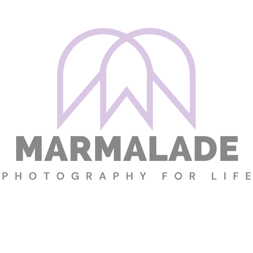 square lavender and gray logo for marmalade photography