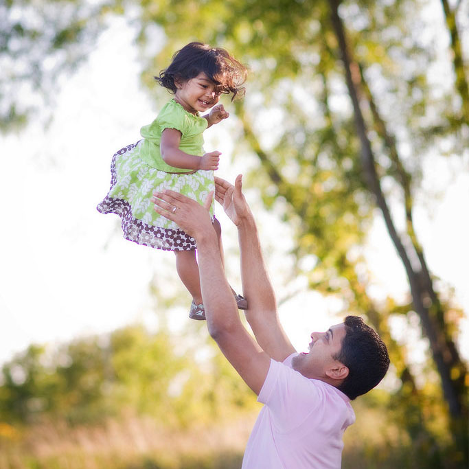 Home 5 Photo of a dad in nature playing with his daughter by Marmalade Photography