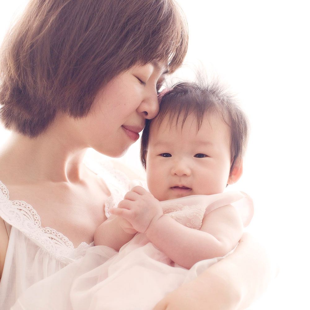 Home 6 Photo from a Gold Coast photo session celebrating a baby's 100 days by Marmalade Photography